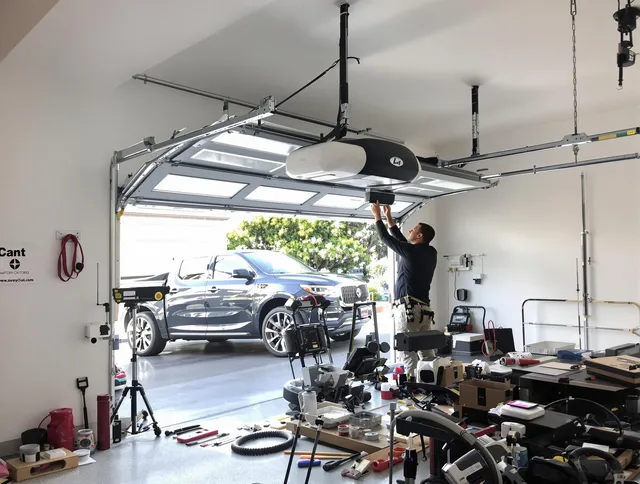 North Smithfield Garage Door Repair specialist installing smart garage door opener system in North Smithfield home